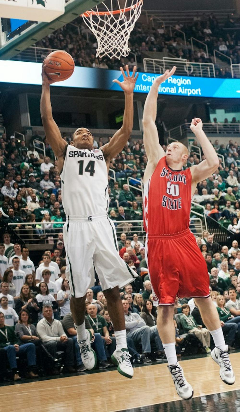 Freshman guard Gary Harris drives the ball down low for a layup Nov. 2, 2012, at the Breslin Center. Harris finished with 11 points during a 62-49 victory over St. Cloud State after the second and final exhibition game of the season. Adam Toolin/The State News