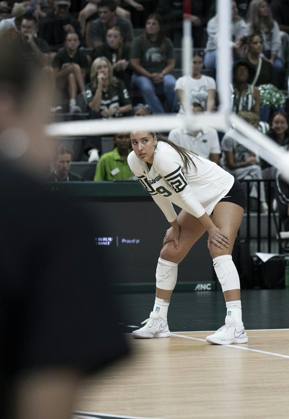 MSU Junior Hayley Ogden #19 sits at the next at the Breslin Center during the MSU v Pennstate Volleyball game In East Lansing, MI on Sunday Sep. 27th, 2026
