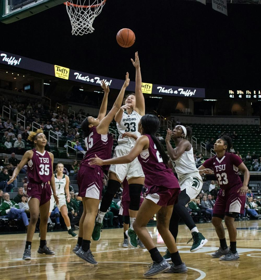 Senior center Jenna Allen (33) makes a shot during the game against Texas Southern University at Breslin Center on Dec. 2, 2018. The Spartans defeated the Tigers, 91-45.