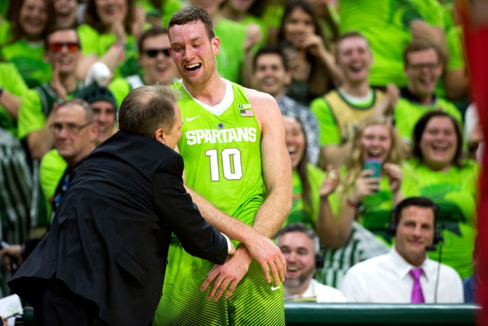 Senior forward Matt Costello celebrates with head coach Tom Izzo during the  game against Maryland on Jan. 23, 2016 at Breslin Center. The Spartans defeated the Terrapins, 74-65.