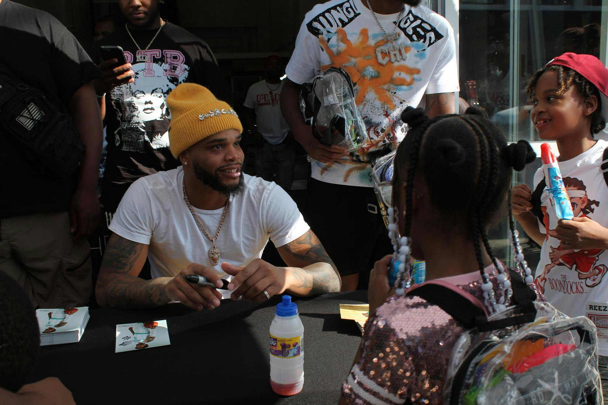 <p>Former MSU men's basketball and Charlotte Hornets player Miles Bridges meets kids at a backpack giveaway in Downtown Flint on July 27, 2024.</p>