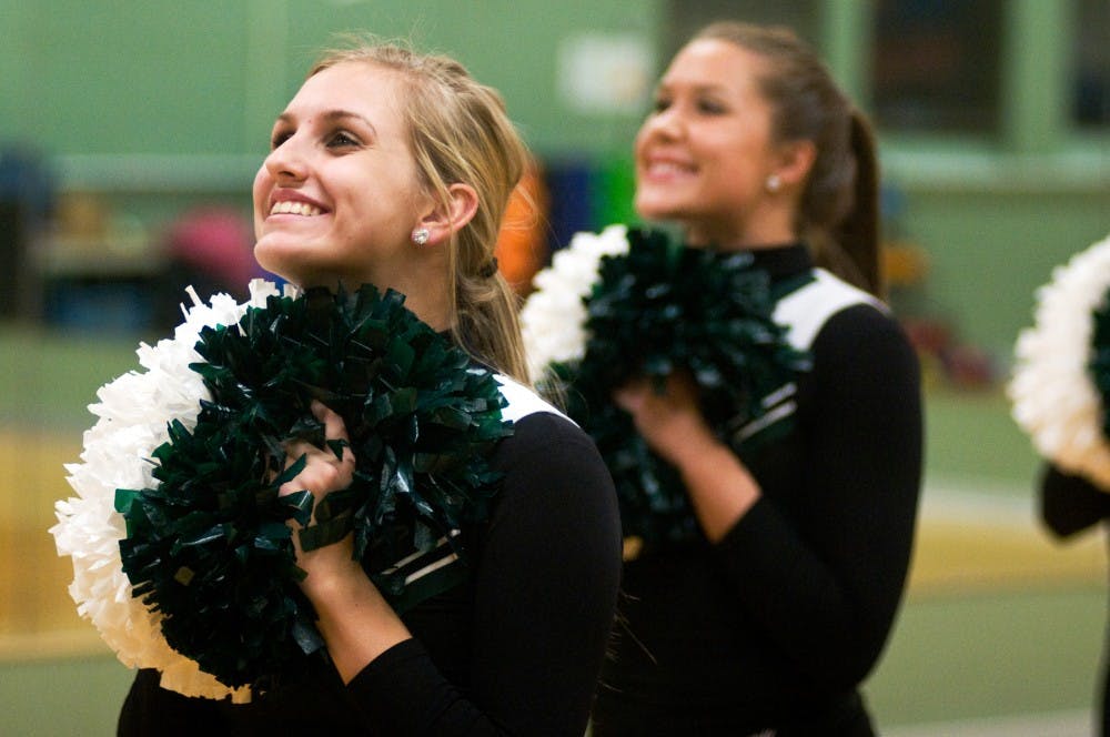 Sophomore Lindsey Piestrak awaits the start of the song to signal the start of her team's routine. Piestrak is apart of MSU's pompon team who have recently won their fifth consecutive Mid American Dance and High Kick Championship. 