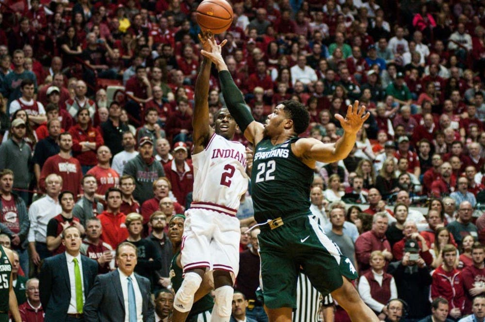 Freshman guard and forward Miles Bridges (22) blocks an attempt at basket by junior guard Josh Newkirk (2) during the men?s basketball game against Indiana on Jan. 21, 2017 at Assembly Hall. The Spartans are down, 30-44. 