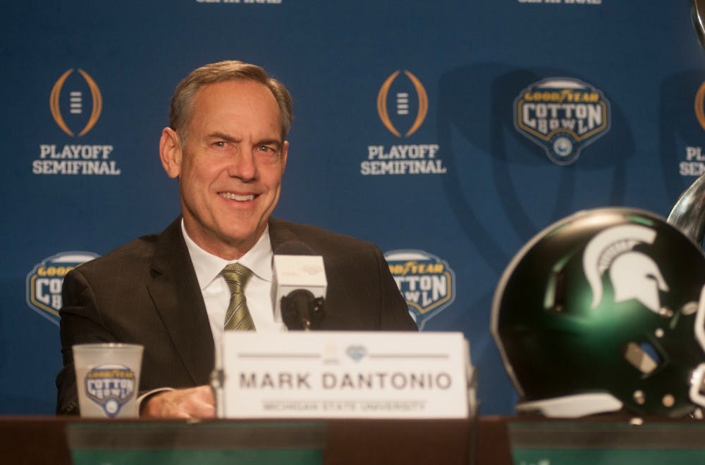 Michigan State head coach Mark Dantonio smiles after a question is asked regarding the upcoming Cotton Bowl game against Alabama during a press conference on Dec. 30, 2015 at the Omni Dallas Hotel in Dallas, Texas.