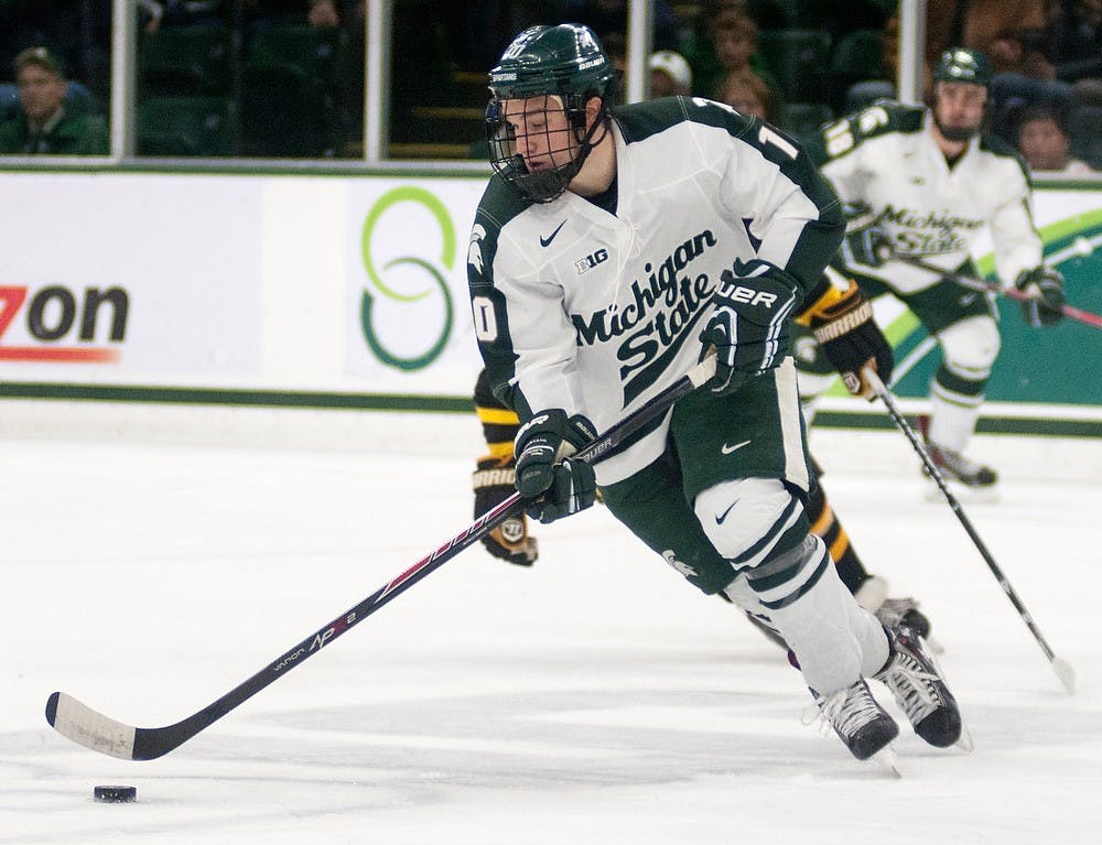 	<p>Junior forward Tanner Sorenson skates down the ice towards the Yellow Jacket net Nov. 3, 2013, at Munn Ice Arena. <span class="caps">MSU</span> defeated American International, 4-0. Danyelle Morrow/The State News</p>