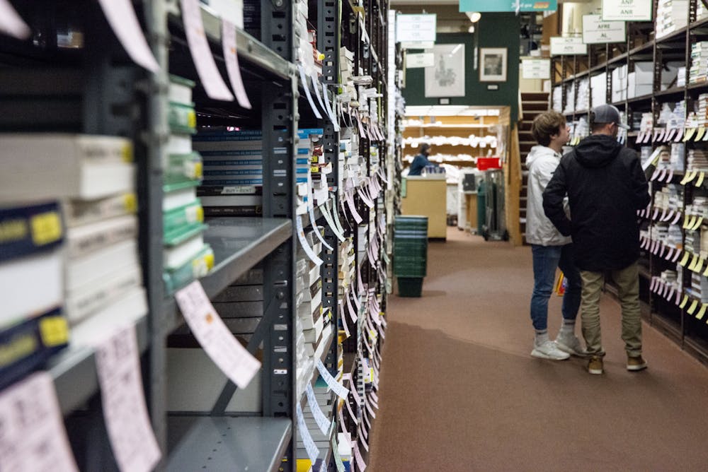 <p>Students looking for textbooks at the Student Book Store in East Lansing on Jan. 12, 2022.</p>
