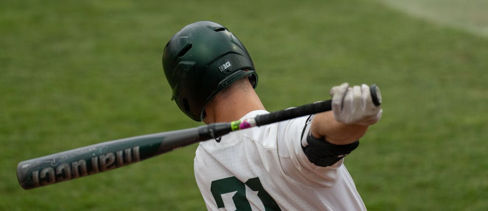 <p>Sophomore centerfielder Jack Frank warms up in the on deck circle while waiting for his next at-bat. MSU lost to Western Michigan 18-7 on April 13, 2022.</p>