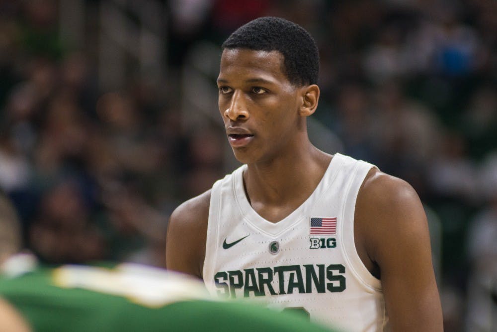 Freshman forward Marcus Bingham Jr. (30) shoots a free throw during the game against Northern Michigan at Breslin Center on Oct. 30, 2018. The Spartans defeated the Wildcats, 93-47.