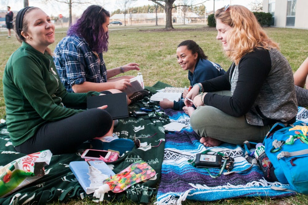 From left to right, James madison freshmen Allie Pail, Dana McDorman-Kolata, Claudia Allou and Georgia Artzberger study outside on Feb.19, 2017 at Case Hall. They had gone to get gelato together prior to their study session. 