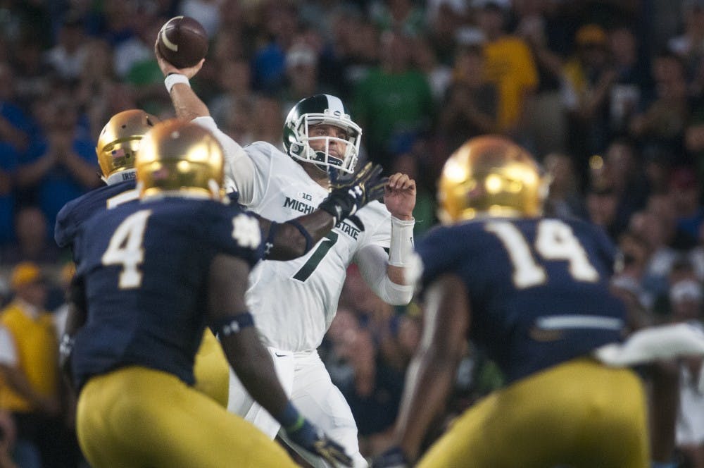 Senior quarterback Tyler O'Connor (7) throws the football during the game against Notre Dame on Sept. 17, 2016 at Notre Dame Stadium in South Bend, Ind. The Spartans defeated the Fighting Irish, 36-28.
