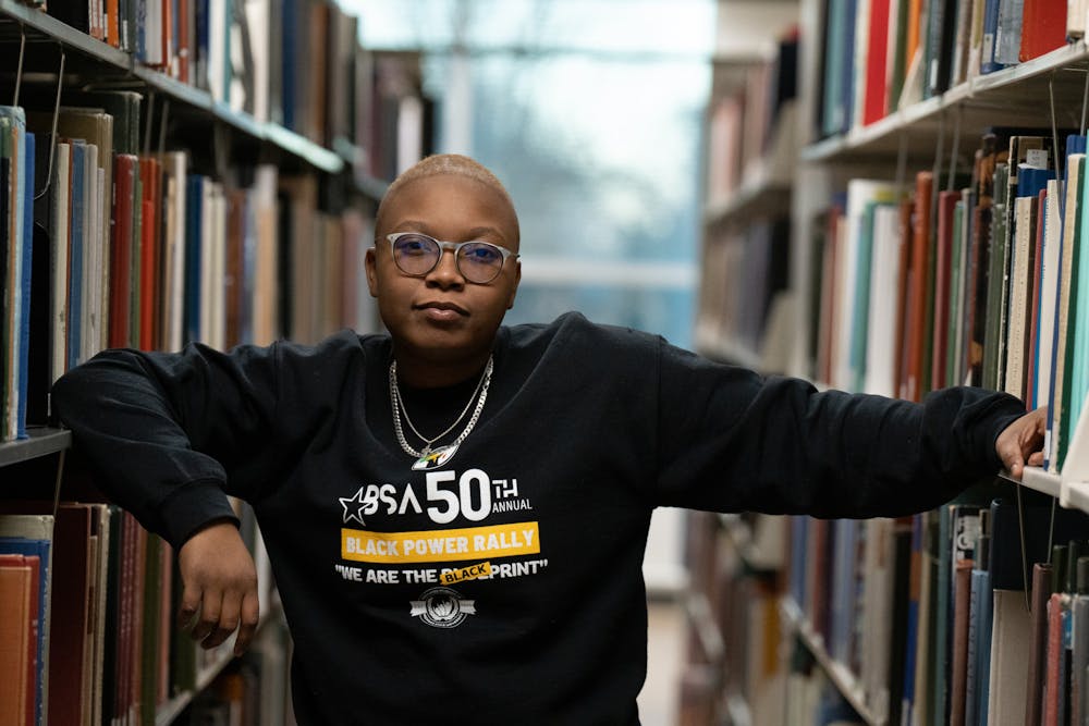 Black poet society president, Joya Bailey photographed in the MSU library, December 1, 2022