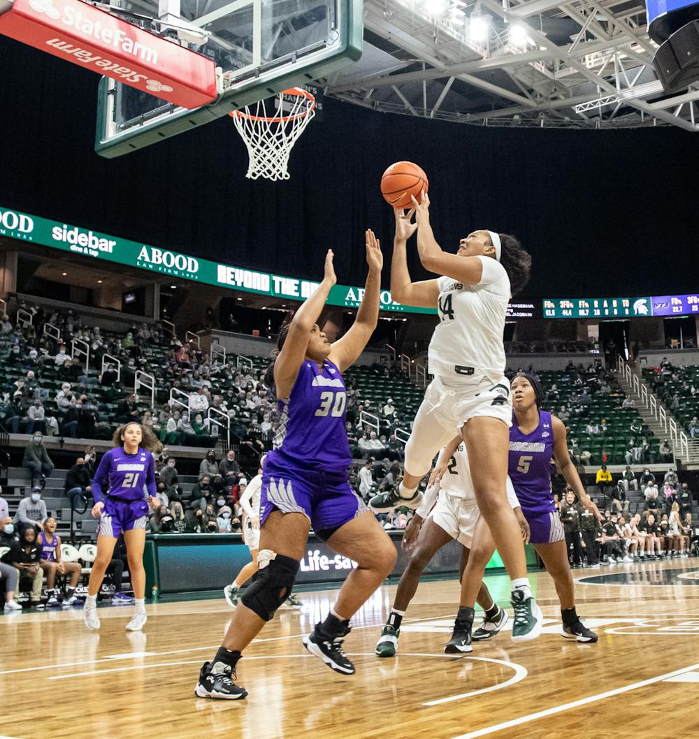 <p>Michigan State&#x27;s Taiyier Parks (14) attempts to score during Michigan State&#x27;s victory over the Niagara Purple Eagles on Nov. 14, 2021.</p>