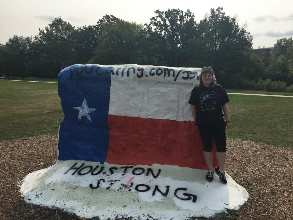 <p>Rachel Powell painted the Rock a week ago "Houston Strong" and nearly a week later the Rock has been left unbothered, in support of Hurricane Harvey victims. <strong>Photo courtesy: Rachel Powell</strong></p>