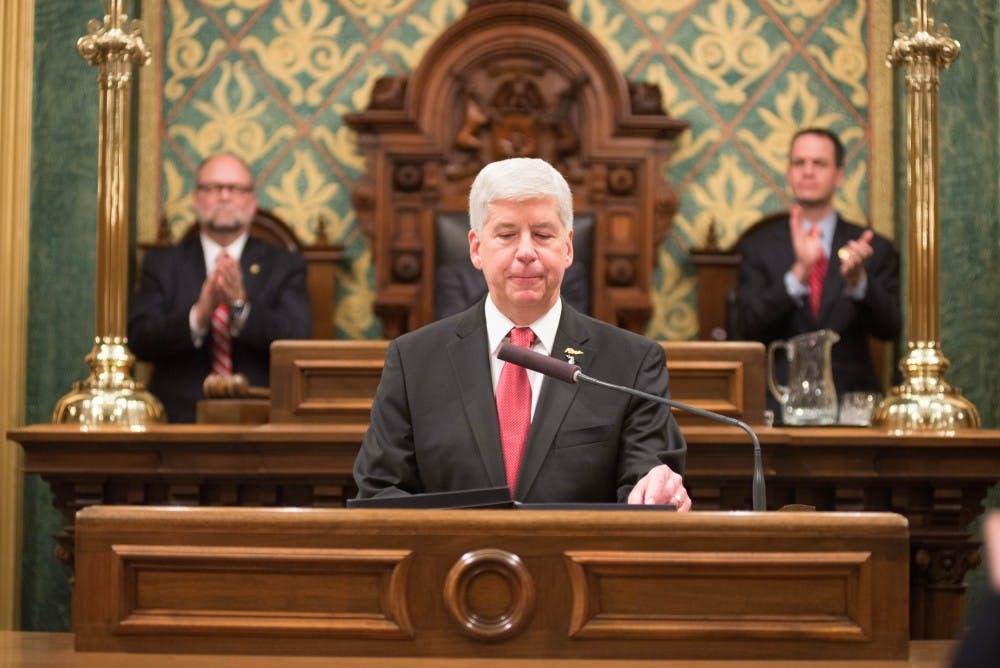 <p>Michigan Gov. Rick Snyder addresses the audience on Jan. 19, 2016 during the State of the State Address at the Capitol in Lansing, Michigan.</p>
