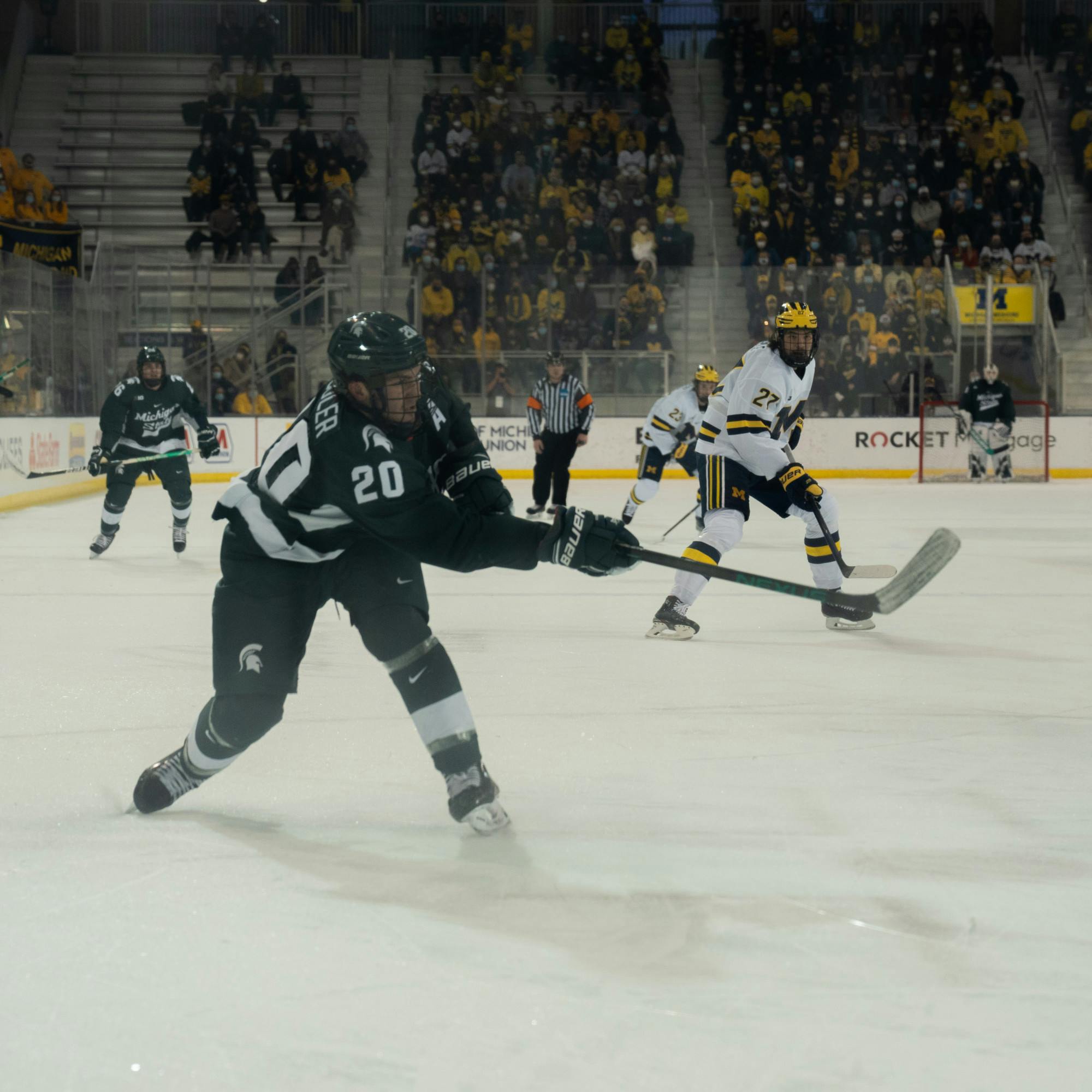 <p>Junior center Josh Nodler (20) takes a shot against the University of Michigan. MSU Hockey fell to the University of Michigan, 4-1, in the first game of the Big Ten Men&#x27;s Hockey Tournament at the Yost Ice Arena on March 4, 2022.</p>