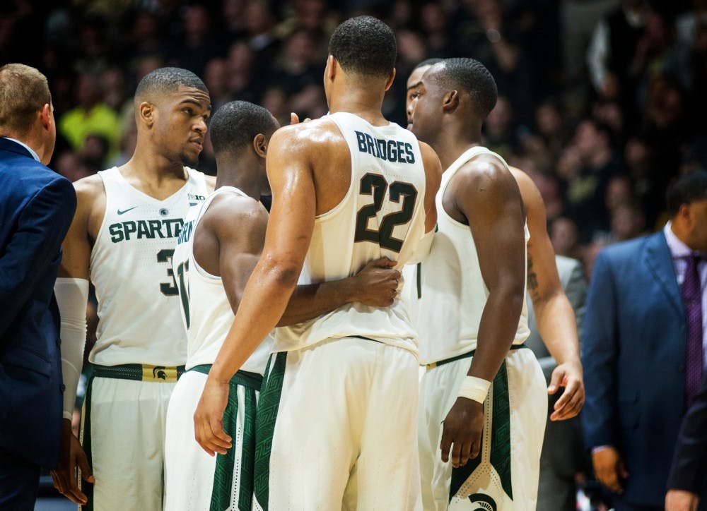 The Spartans huddle during the second half of the men's basketball game against Purdue on Feb. 18, 2017 at Mackey Arena in Lafayette, Ind. The Spartans were defeated by the boilermakers, 80-63.