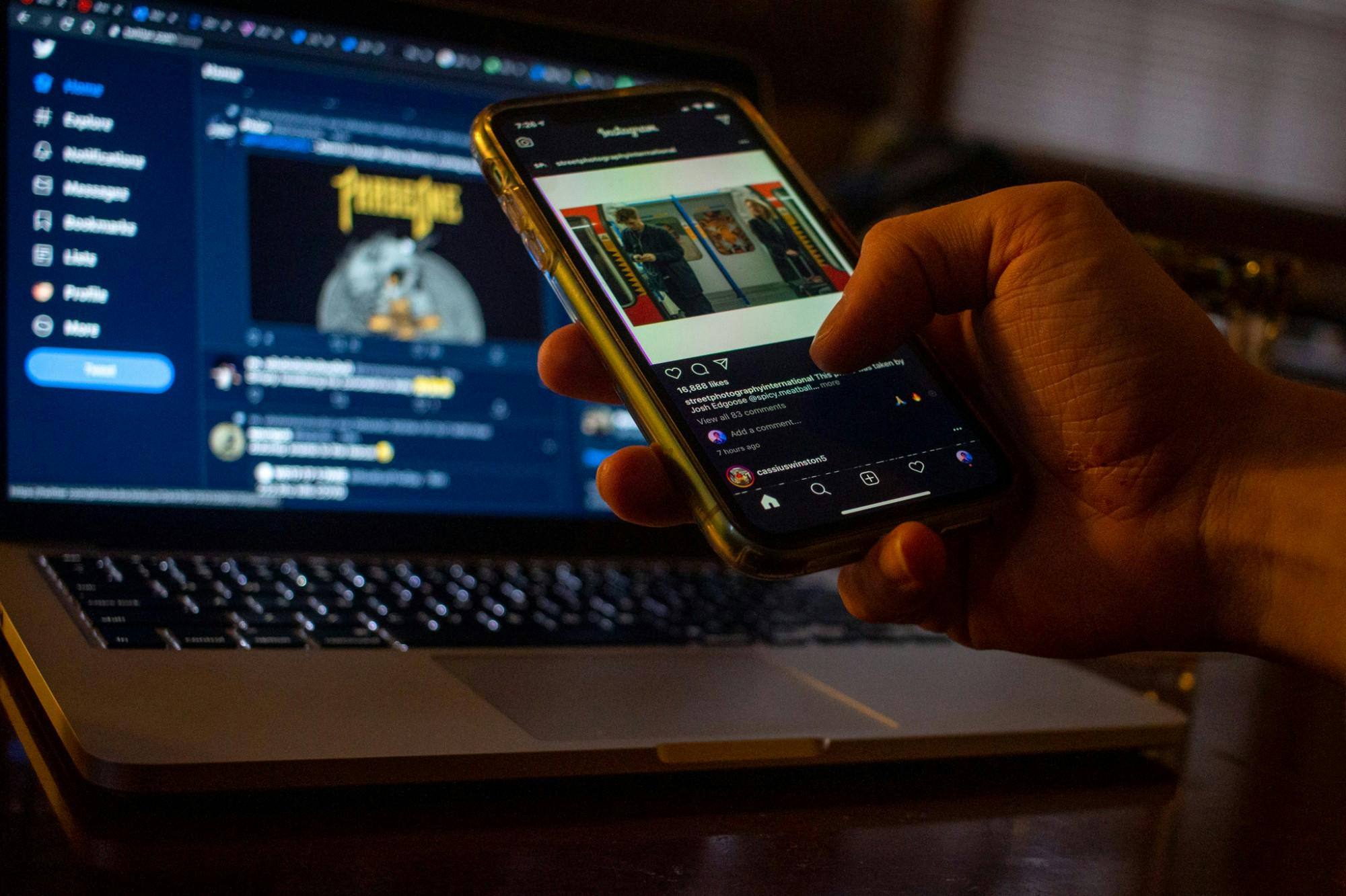 <p>An MSU student checks social media during the coronavirus stay-in-place quarantine March 30, 2020.</p>