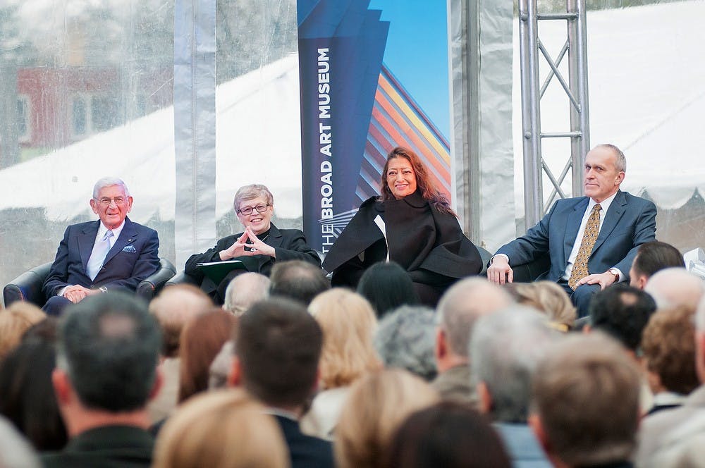 <p>From left, founding donor Eli Broad, MSU President Lou Anna K. Simon, architect Zaha Hadid and MSU provost Kim Wilcox smile on Saturday, Nov. 10, 2012, at the Eli and Edythe Broad Art Museum. The four were taking part in the dedication of the art museum. James Ristau/The State News</p>