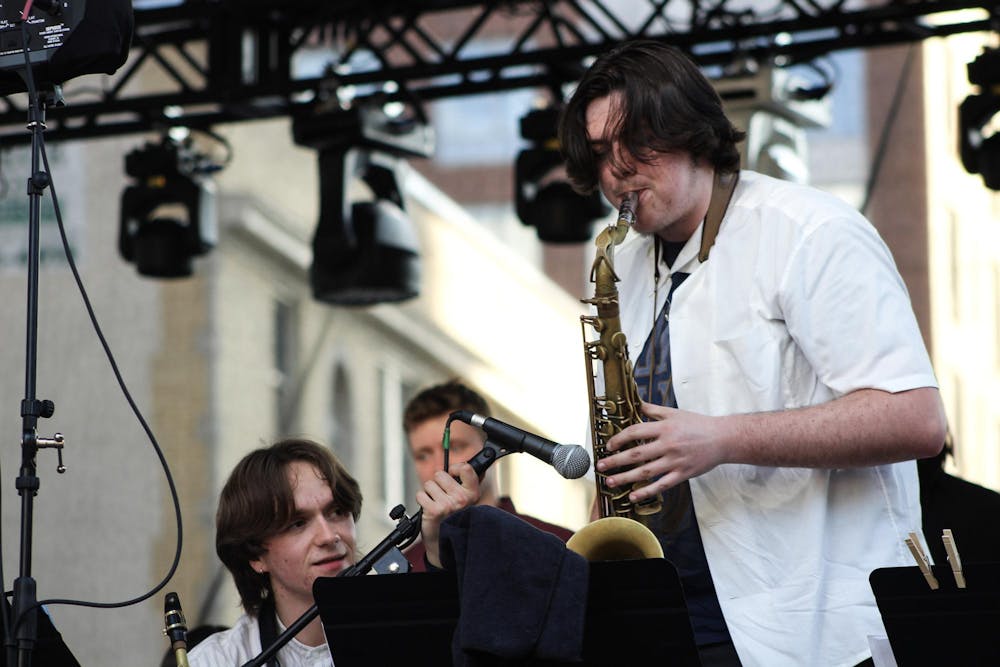 <p>A saxophonist with The Gathering Orchestra plays his solo at the East Lansing Summer Solstice Jazz Festival on June 21, 2024.</p>