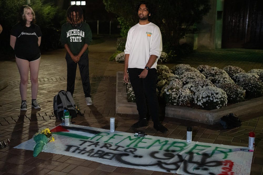 Michigan State Hurriyeh member and political science sophomore Vivek Kilari begins the anniversary memorial for Michigan State Humphrey fellow and Israeli bombing victim Tariq Thabet on Oct. 30, 2024.