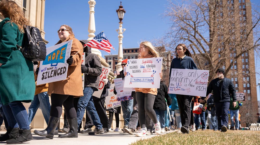 <p>Protestors march together during the No Kings Protest at the Michigan State Capitol in Lansing, MI on March 28, 2026.</p>