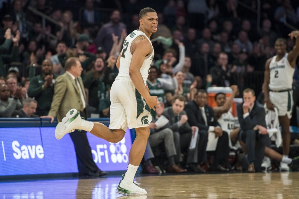 Sophomore guard Miles Bridges (22) runs towards the other end of the court after making a 3-pointer during the first half of 2018 Big Ten Men's Basketball quarterfinal game against Wisconsin on March 2, 2018 at Madison Square Garden in New York. (Nic Antaya | The State News)