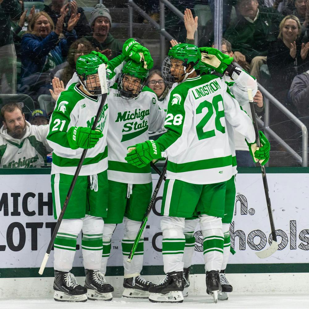 <p>The No.1 ranked MSU hockey team celebrates after a goal is scored vs. Notre Dame at Munn Ice Arena in East Lansing, MI on Feb. 19, 2026.</p>
