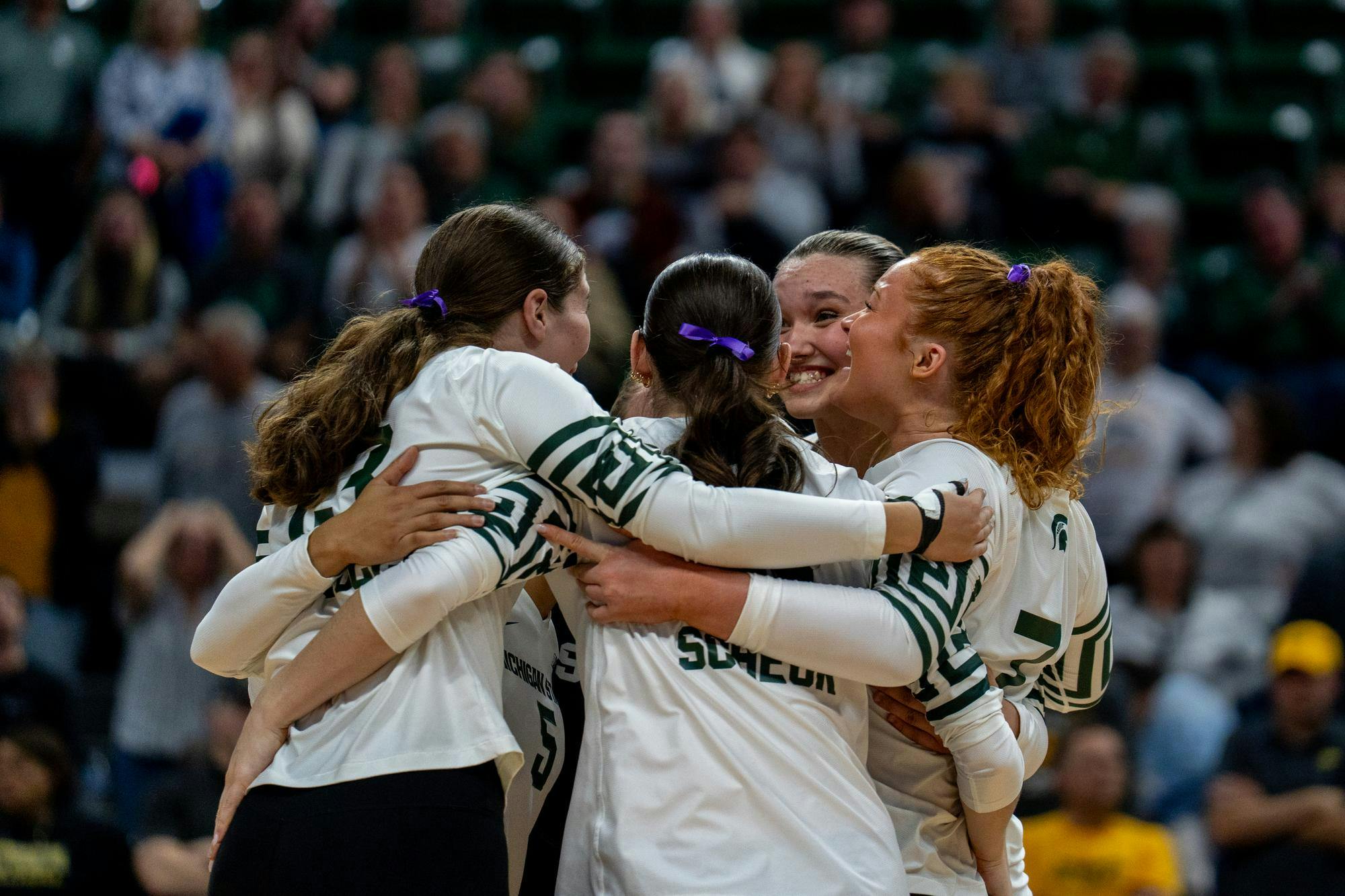 <p>MSU cheers after winning a point in the first set during the MSU v Iowa volleyball game at the Breslin Event Center in East Lansing on Friday, Oct. 10, 2025.</p>