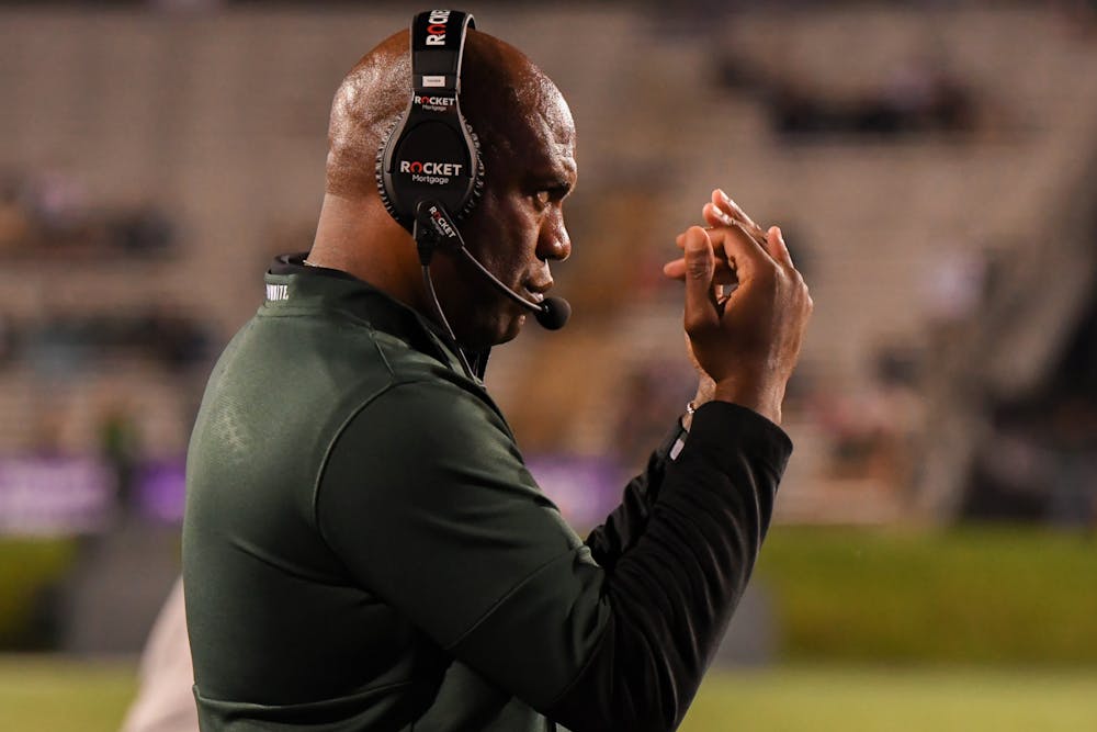 <p>Head Coach Mel Tucker calls his players off the field, after a defensive stand, during the Spartans game against Northwestern. Michigan State won the season opener at Ryan Field 38-21, on Sep. 3, 2021.</p>