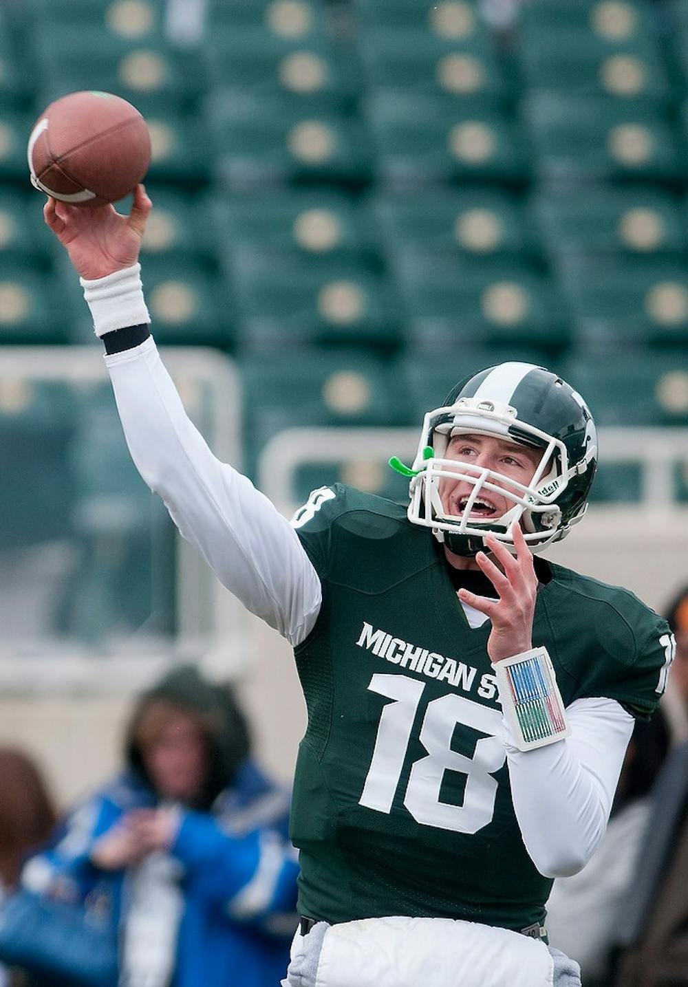 	<p>Sophomore quarterback Connor Cook throws the ball during the Green and White Spring Game on April 20, 2013, at Spartan Stadium. The White team won 24-17. Julia Nagy/The State News</p>