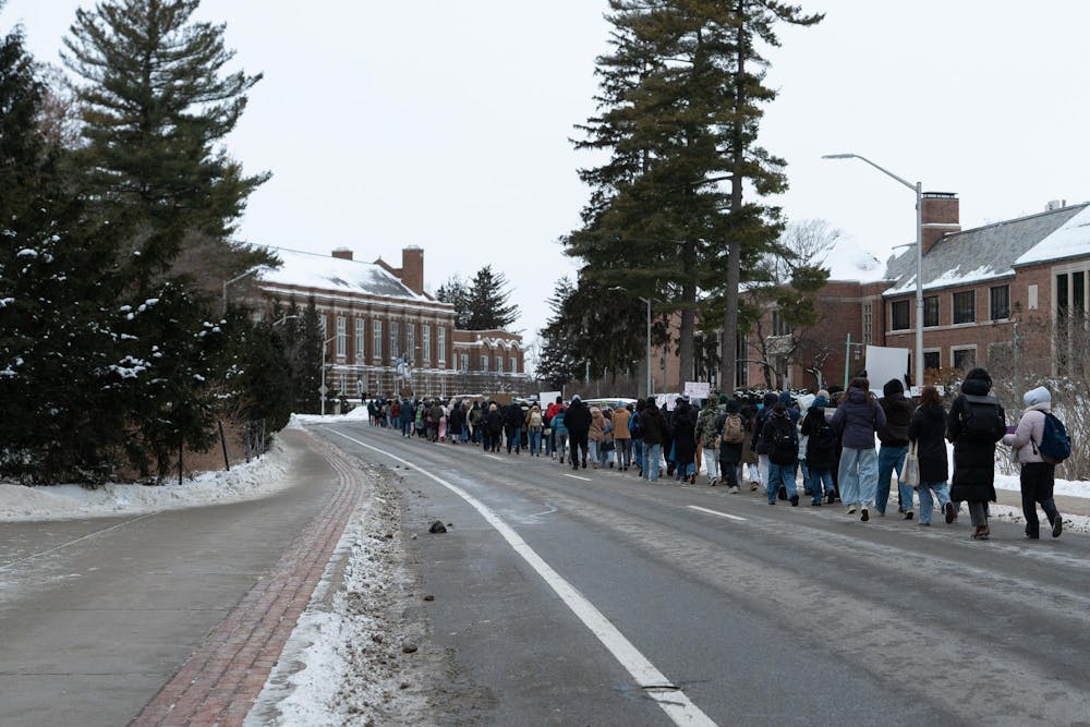 <p>Students protest ICE while walking to Michigan State's Spartan Statue in East Lansing, Michigan on Thursday, Jan. 29, 2026.</p>