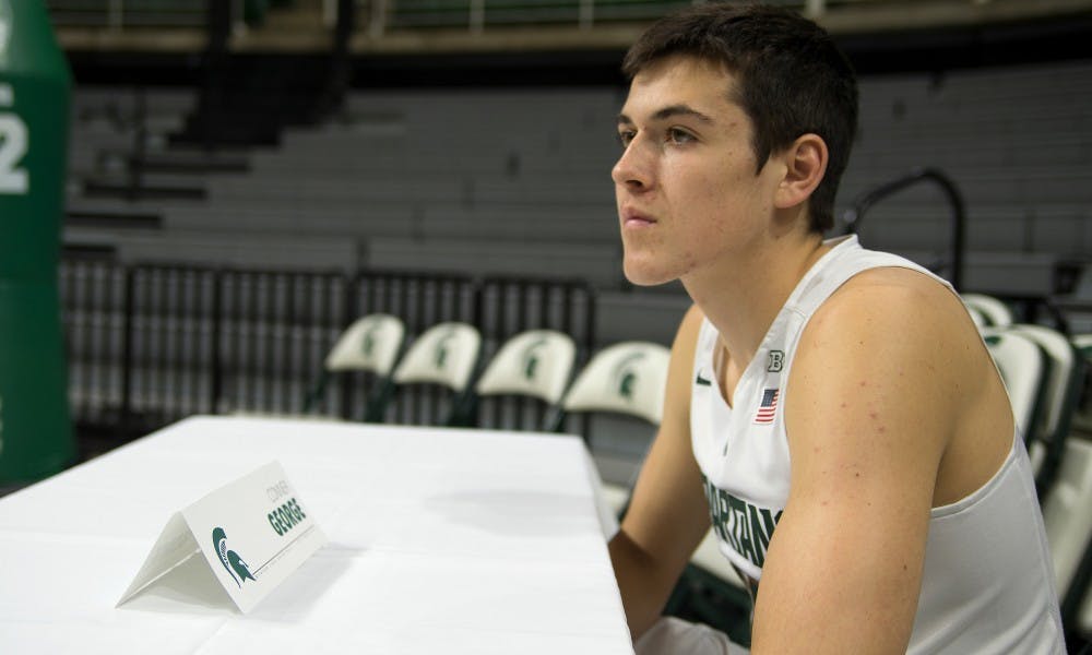 <p>Freshman guard Conner George waits to speak to media during men's basketball media day on Oct. 27, 2015 at Breslin Center.</p>