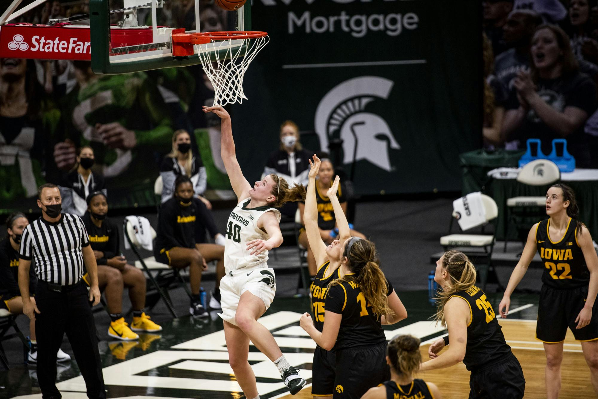 <p>Sophomore guard Julia Ayrault (40) shoots a basket during the game against Iowa on Dec. 12, 2020, at the Breslin Center. The Spartans defeated the Hawkeyes 86-82.</p>