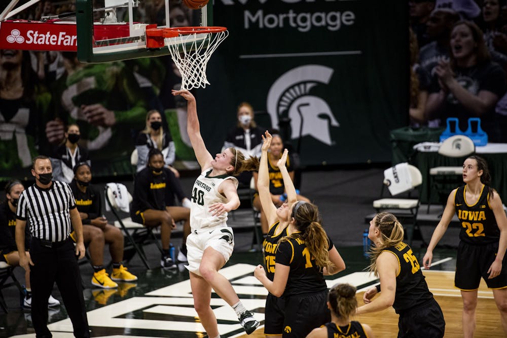 <p>Sophomore guard Julia Ayrault (40) shoots a basket during the game against Iowa on Dec. 12, 2020, at the Breslin Center. The Spartans defeated the Hawkeyes 86-82.</p>