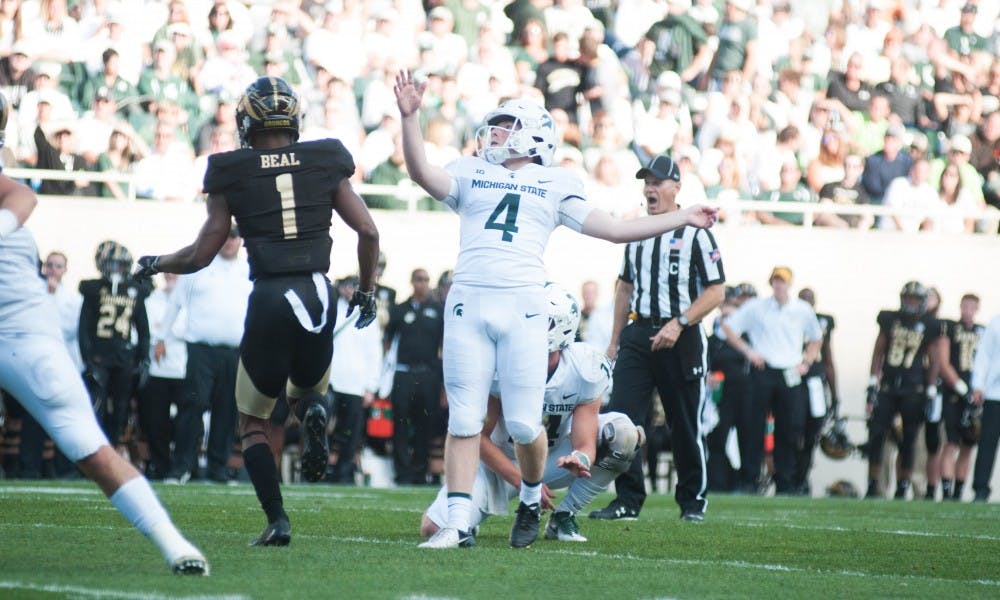 <p>Freshman kicker Matt Coghlin (4) kicks an extra point during the game against Western Michigan University on Sep. 9, 2017 at Spartan Stadium. The Spartans defeated the Broncos 28-14.</p>
