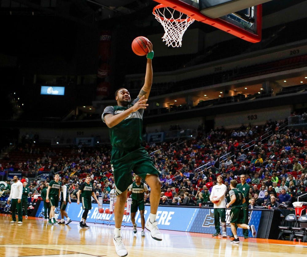 <p>Junior forward Nick Ward (44) makes a shot during an open practice on March 20, 2019, at Wells Fargo Arena.</p>