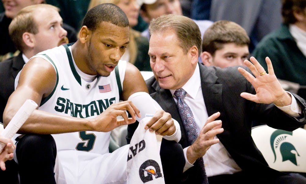 Sophomore center Adreian Payne listens to head coach Tom Izzo during the game on Sunday.The Spartans defeated the Trojans 69-47 Sunday night at Breslin Center. Anthony Thibodeau/The State News