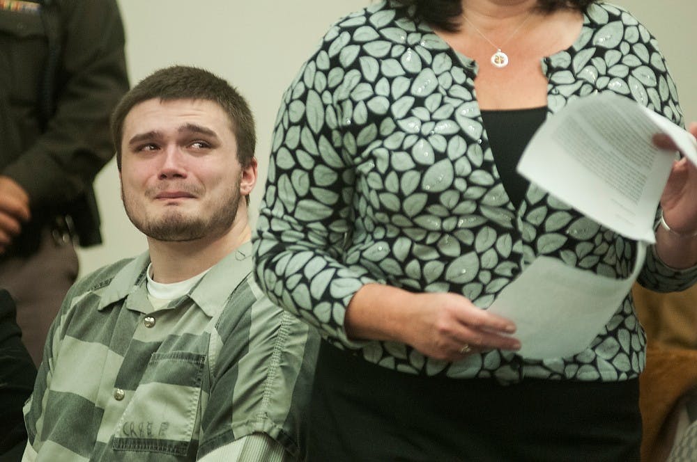 	<p>Convicted murderer Connor McCowan gets emotional during his mother Judy&#8217;s statement at his sentencing hearing Nov. 6, 2013, at Ingham County Circuit Court in Lansing. McCowan was sentenced to 20-60 years in prison.</p>