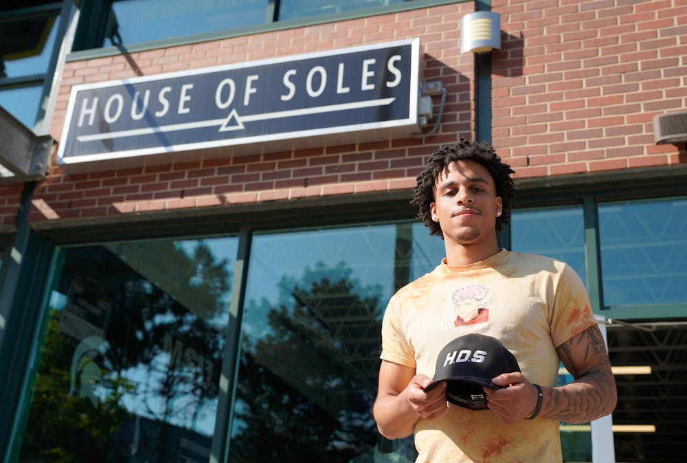 <p>House of Soles co-founder Lonnie Smith stands in front of the Grand River storefront on May 15, 2024.</p>