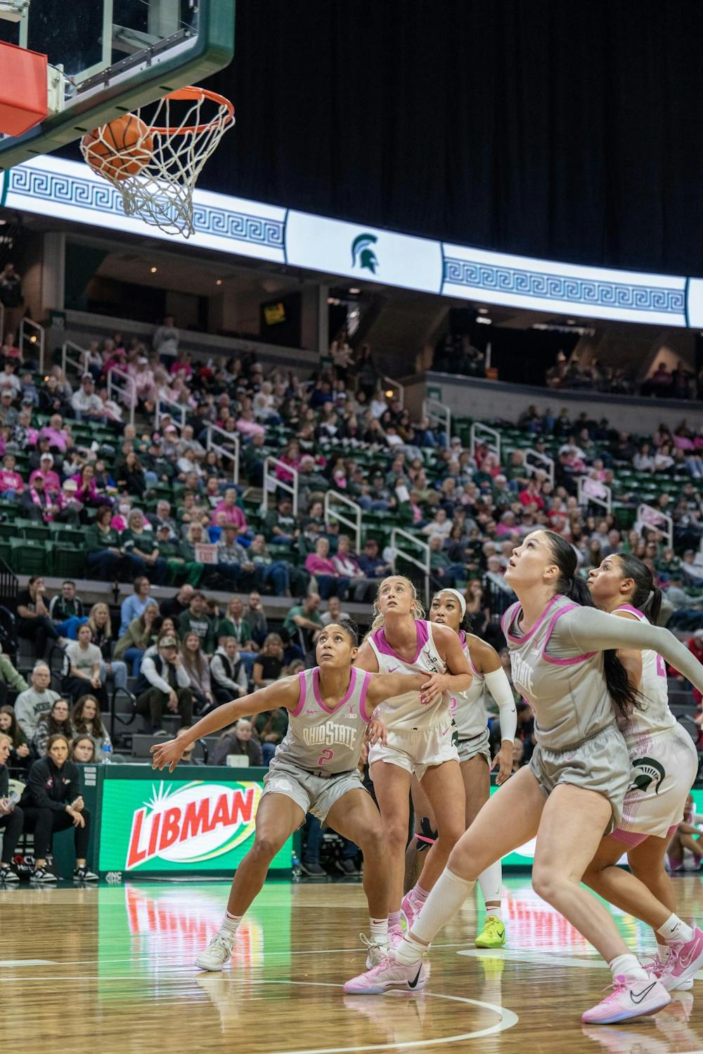 <p>Both teams eagerly watch the Spartans score another two points due to graduate guard Julia Ayrault’s (40) successful shot at the Breslin Center on Feb. 11, 2024. The Spartans lost to the Buckeyes 71-86.</p>