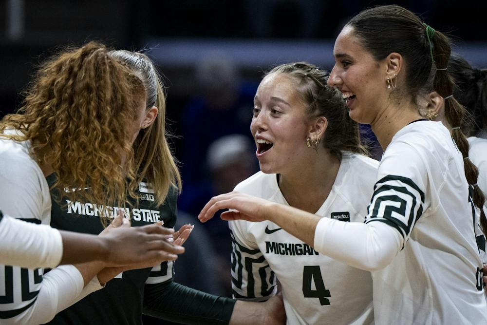 Michigan State freshman outside hitter Madi Andrews (4) celebrates with her teammates during a match at the Breslin Center in East Lansing, Mich., on Friday, Sept. 2026.