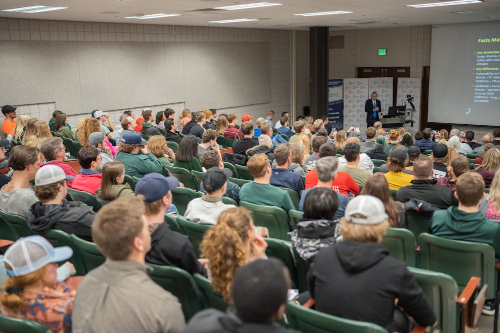 <p>Dr. Scott Atlas discusses COVID-19 with a crowd. Atlas, the former COVID-19 advisor to President Donald Trump, spoke at a Turning Point MSU event in Wells Hall on March 23, 2022.</p>