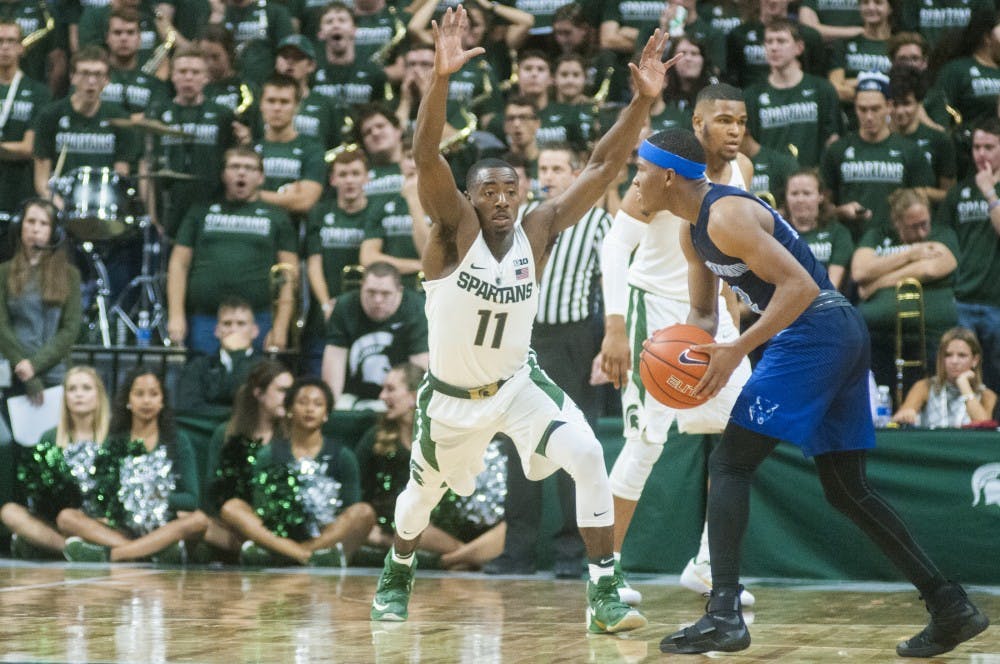 Junior guard Lourawls Nairn Jr. (11) guards Northwood guard Jarel Woolridge (12) during the basketball game against Northwood on Oct. 27, 2016 at Breslin Center. The Spartans defeated the Timberwolves, 93-69. 