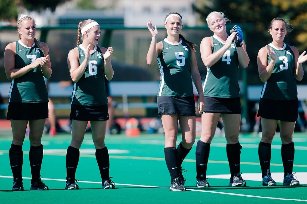 	<p>Junior forward Abby Barker waves to the crowd on Sept. 28, 2013 at Ralph Young Field before the game against Ohio state. The Spartans defeated the Buckeyes 3-2. Georgina De Moya/The State News</p>