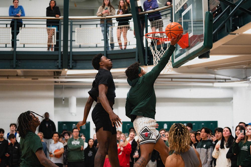 <p>Michigan State sophomore guard Jeremy Fears Jr. drives towards the rim at IM East on April 16, 2025. The men's basketball team showed off their skills during pickup runs for students to watch.</p>