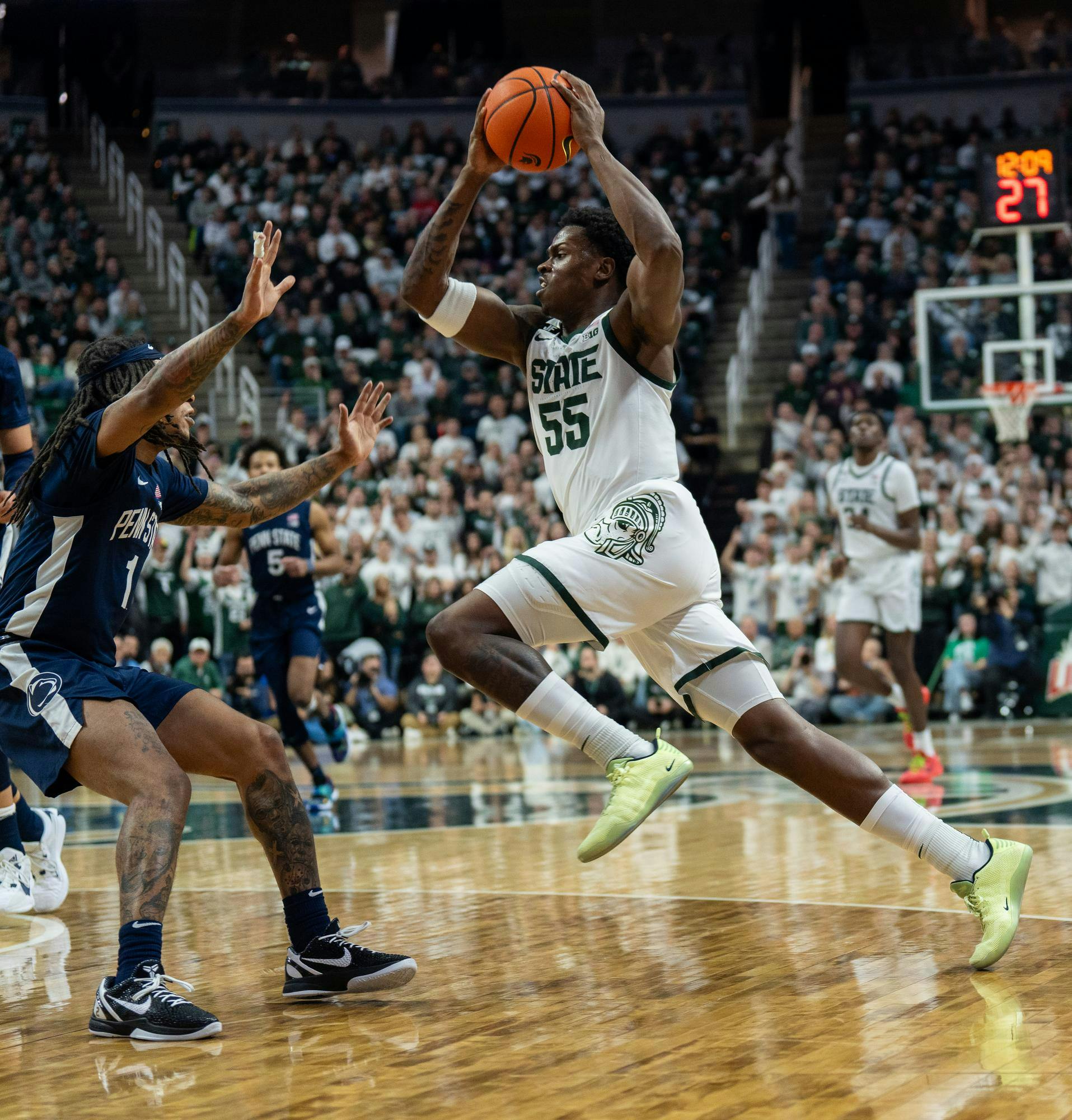 <p>Michigan State sophomore forward Coen Carr (55) drives the basket against Penn State in the Breslin Center on Jan. 15, 2025. The Spartans beat the Nittany Lions, 90-85.</p>