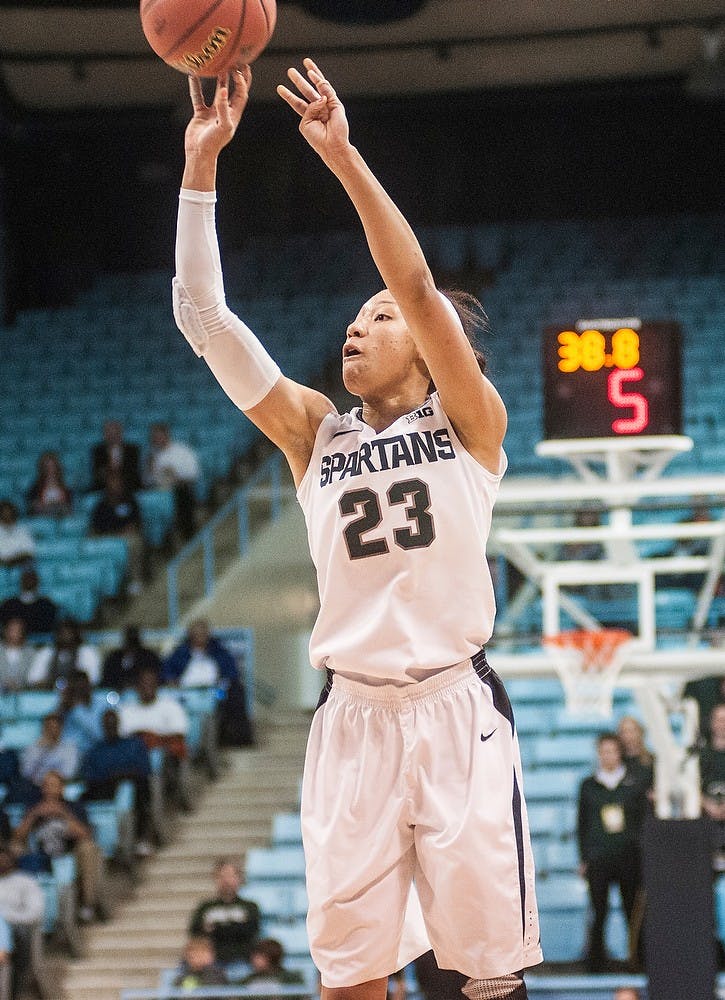 <p>Redshirt freshman Aerial Powers shoots March 22, 2014, after she fell in a previous play during a game at the NCAA tournament at Carmichael Arena in Chapel Hill, N.C. The Spartans defeated the Pirates, 91-61. Erin Hampton/The State News</p>