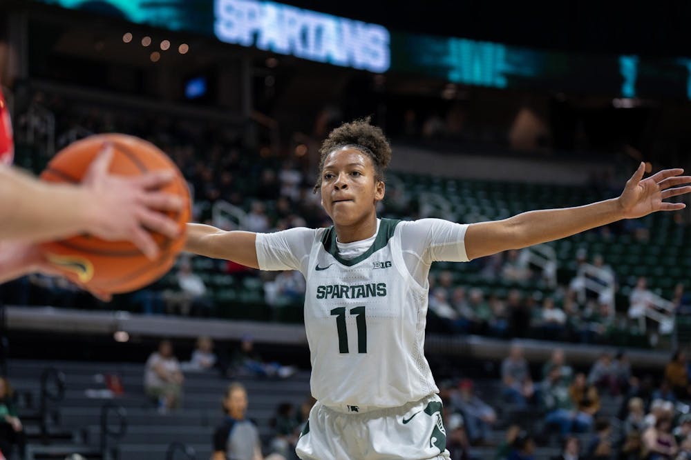<p>Spartan junior guard/forward Jocelyn Tate (11) on defense during Michigan State's game against Detroit Mercy at the Breslin Student Events Center on Nov. 16, 2023. Tate's Spartans were victorious, defeating the Detroit Mercy Titans 105-44.</p>
