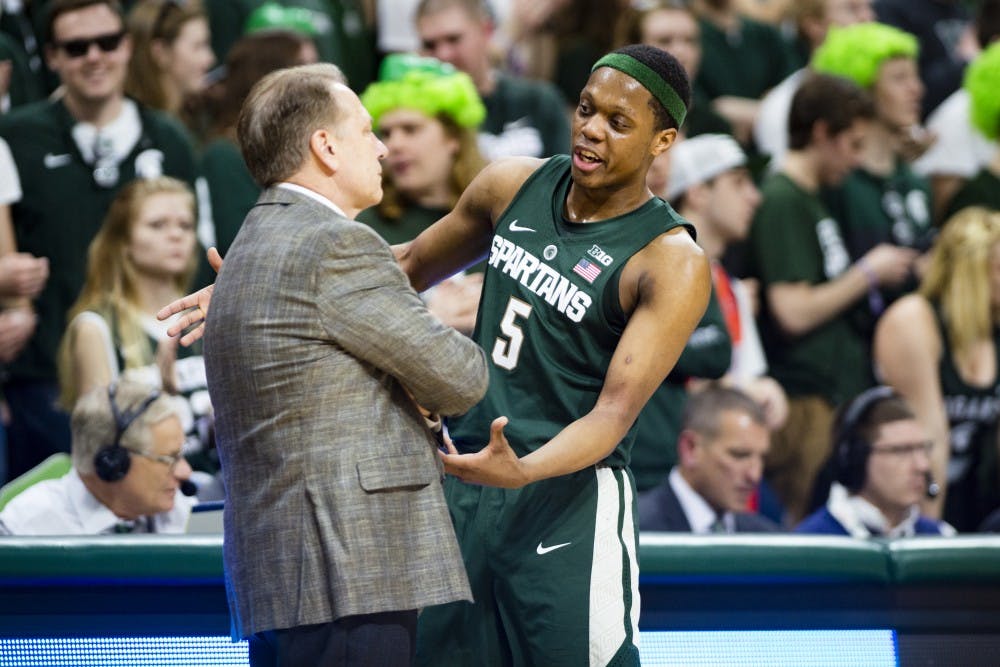Head coach Tom Izzo reacts and freshman guard Cassius Winston (5) share a moment during the second half of men's basketball game against the University of Nebraska on Feb. 23, 2017 at Breslin Center. The Spartans defeated the Cornhuskers, 88-72.