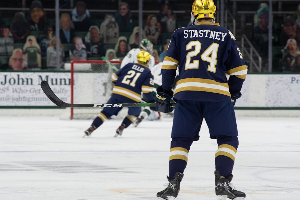 Notre Dame's defenseman Spencer Stastney (24) stands back as action happens towards the goal. Photographed Feb. 26, 2021